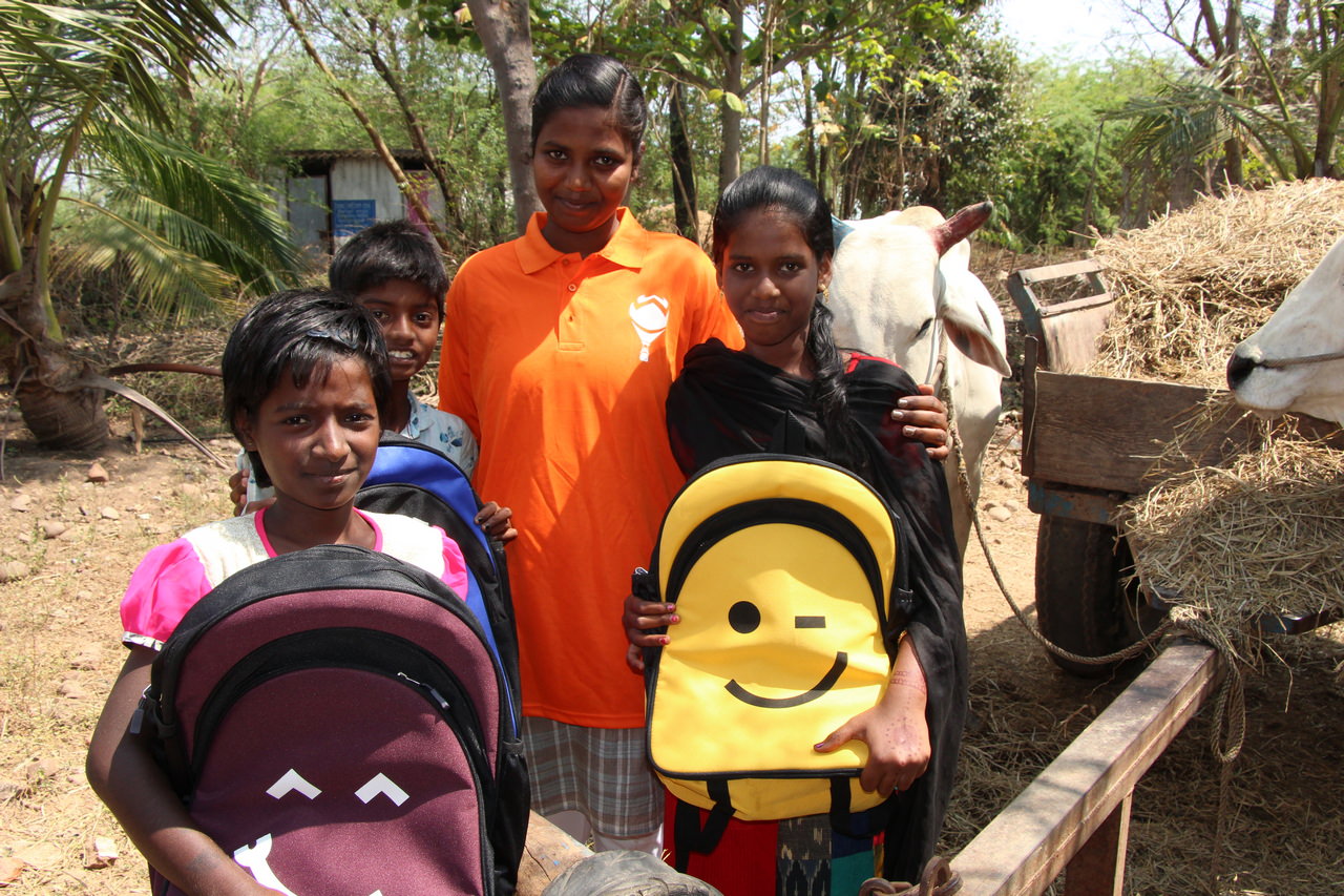 Volunteers share their time and story with young people in the village