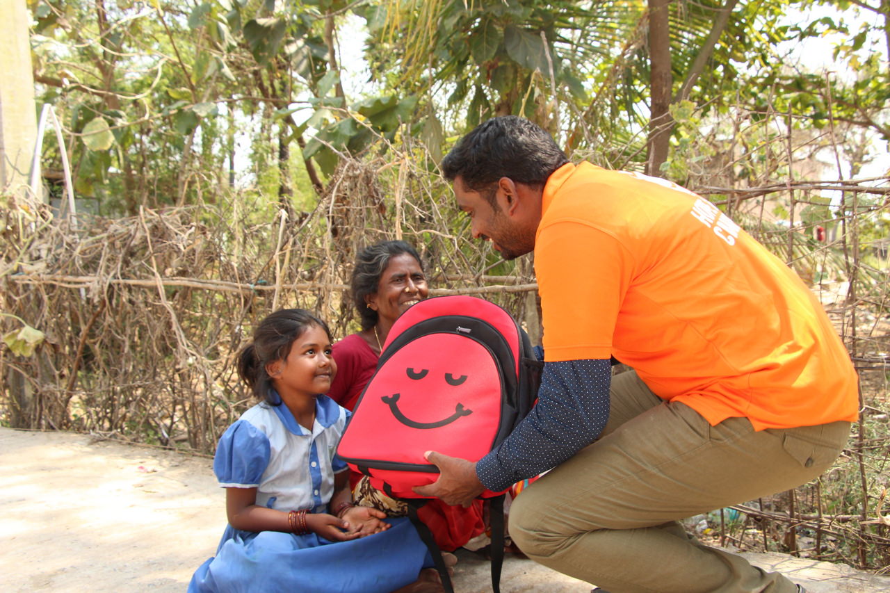 Volunteers have the opportunity to meet parents during distribution