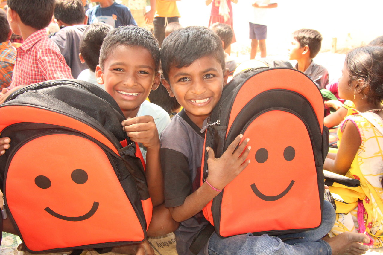 Happy boys with their backpacks